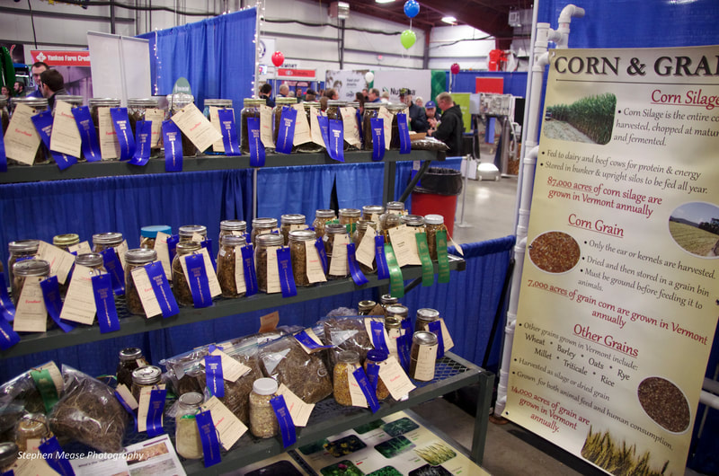 VT Farm Show vendor with award ribbons 